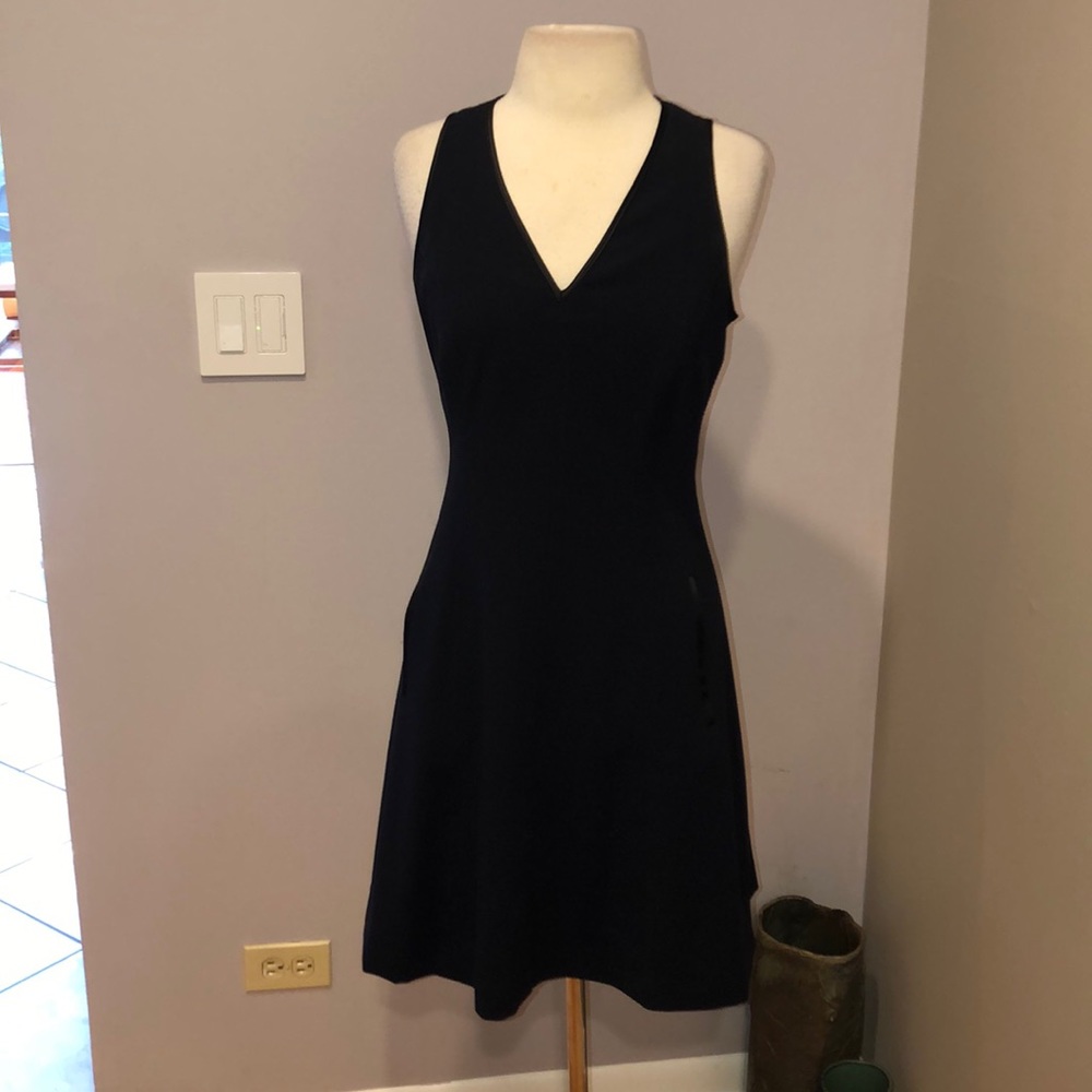 EUC TAHARI NAVY FIT AND FLARE DRESS